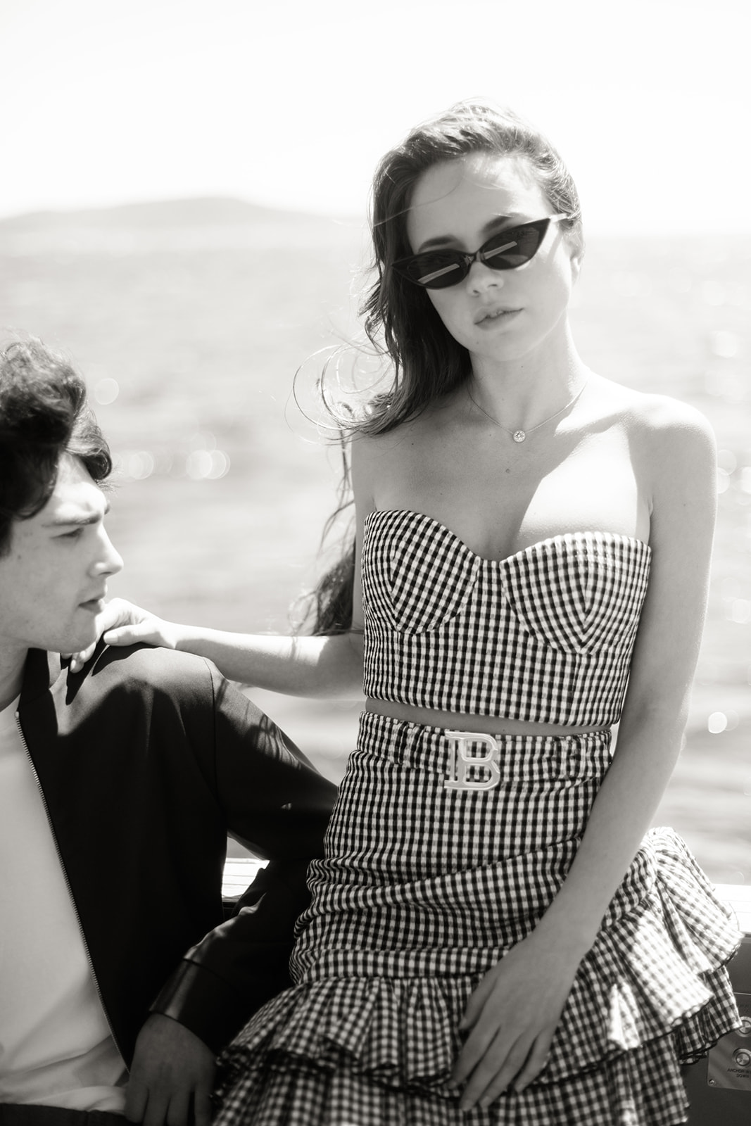 Black-and-white fashion portrait aboard a yacht off Saint-Tropez